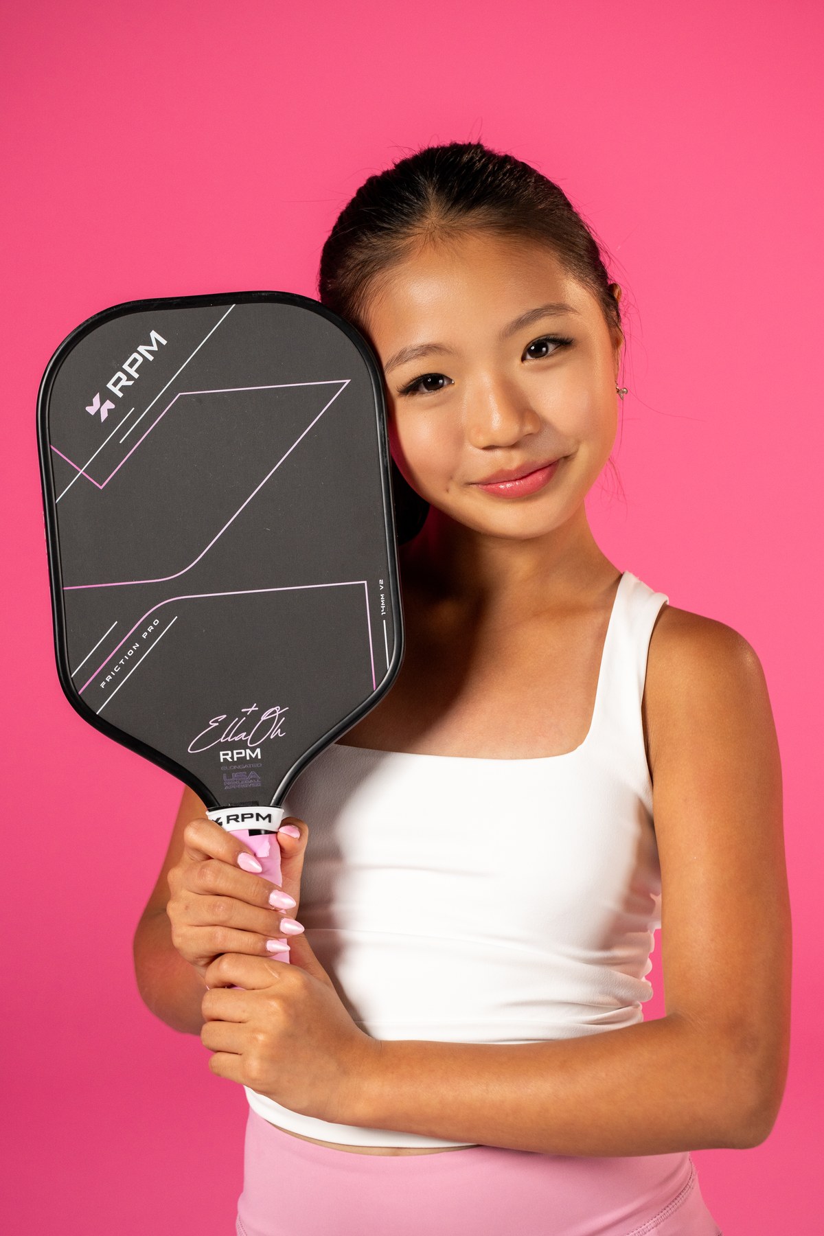 Ella Oh presenting her RPM Friction Pro V2 signature paddle